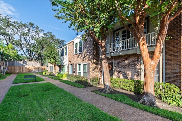 exterior space with a yard