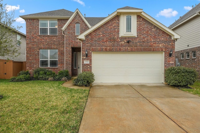 traditional-style home with driveway, brick siding, a front lawn, and an attached garage