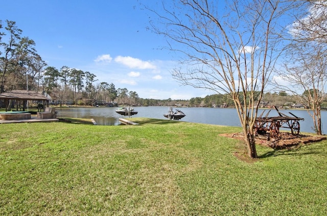 view of yard with a water view and a gazebo