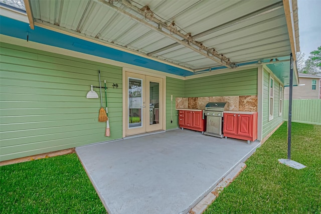 view of patio / terrace with fence and grilling area