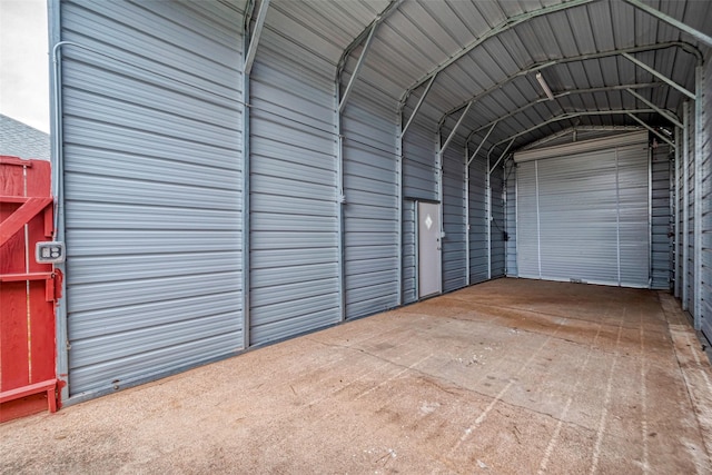 garage featuring a detached carport