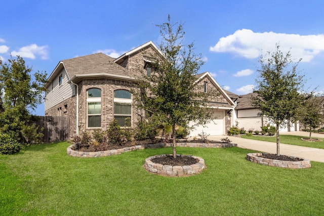 view of front facade with a garage and a front lawn