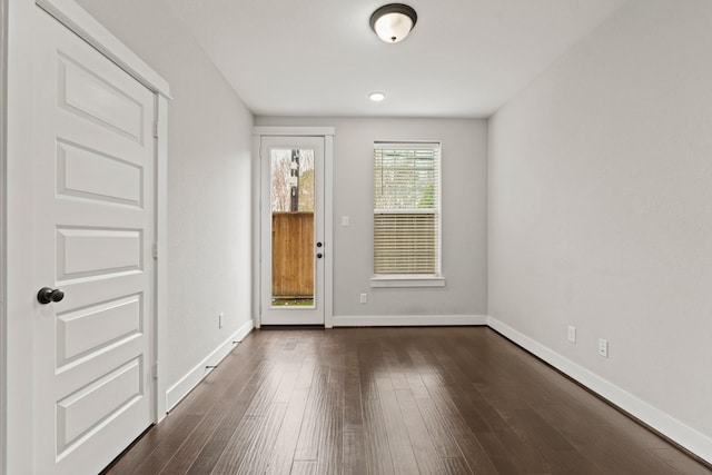 interior space with dark hardwood / wood-style floors