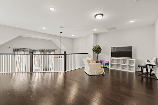 sitting room featuring dark hardwood / wood-style flooring