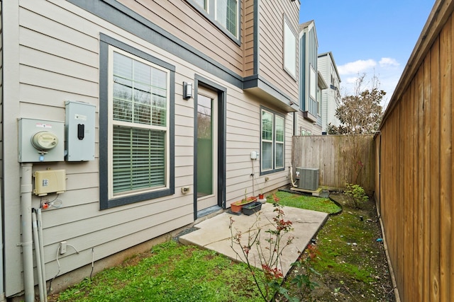 view of home's exterior featuring a patio and central AC