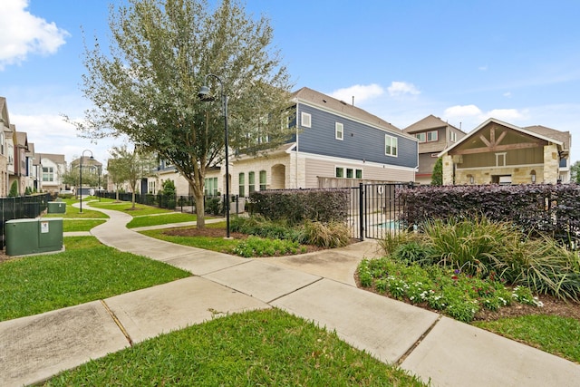 view of community with a yard