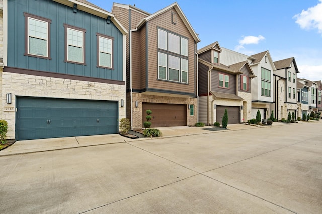 townhome / multi-family property featuring a garage