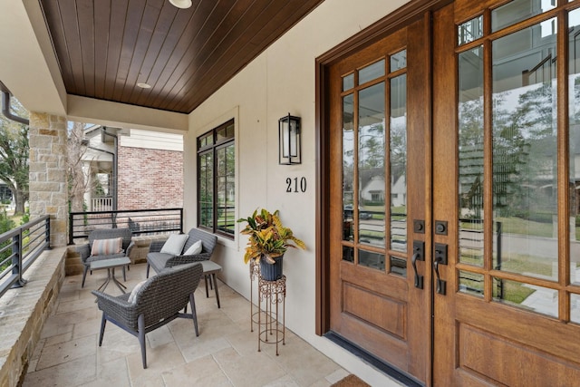 exterior space featuring an outdoor hangout area and french doors