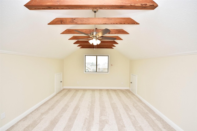 bonus room with vaulted ceiling with beams, light colored carpet, and ceiling fan