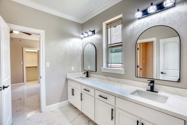 bathroom featuring ceiling fan, vanity, and crown molding