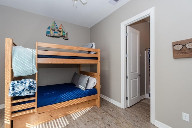 unfurnished bedroom featuring hardwood / wood-style floors