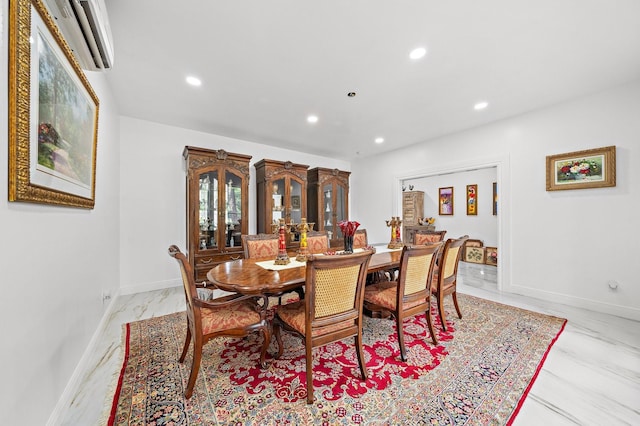 dining area featuring recessed lighting, an AC wall unit, marble finish floor, and baseboards