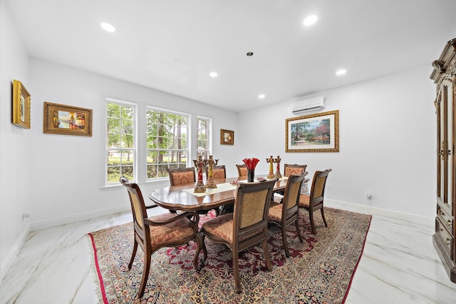 dining space featuring recessed lighting, marble finish floor, and baseboards