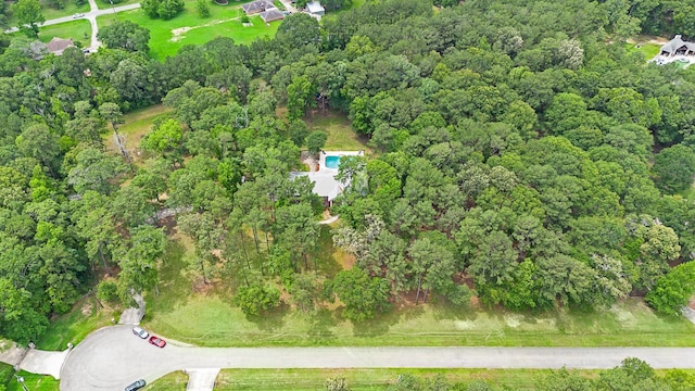 aerial view featuring a view of trees