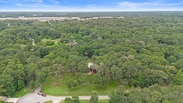 drone / aerial view with a view of trees