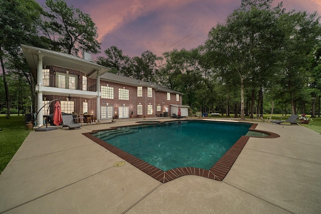 pool with a patio