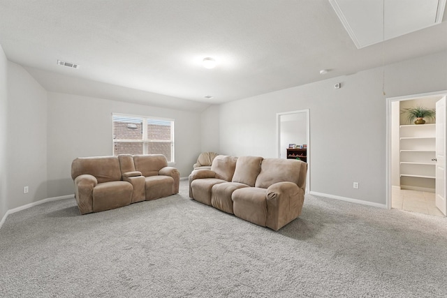 living room featuring light colored carpet