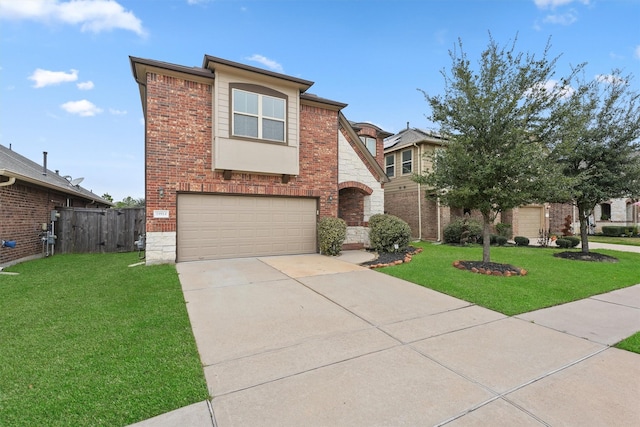 view of front facade with a front yard and a garage