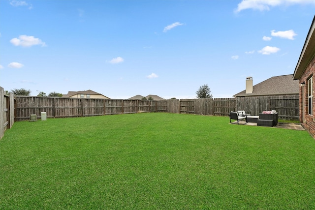 view of yard with an outdoor living space