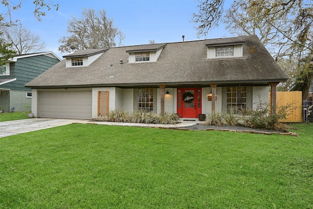 cape cod-style house with a front yard