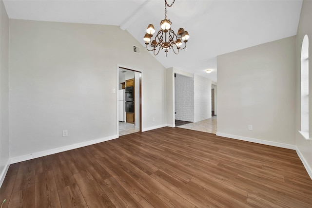 unfurnished room featuring a chandelier, lofted ceiling with beams, baseboards, and wood finished floors