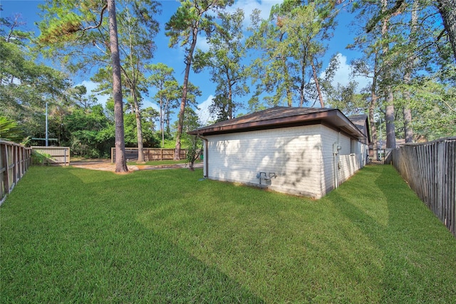 view of yard featuring a fenced backyard