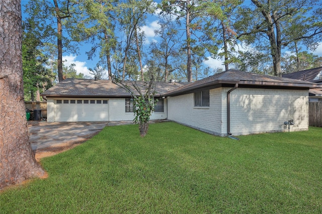 ranch-style home featuring brick siding, a front yard, a garage, and fence