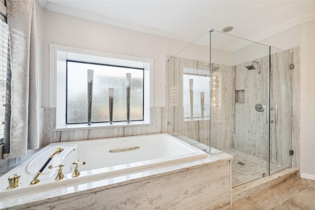 bathroom with separate shower and tub and ornamental molding