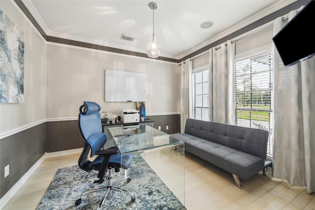 office area with light wood-type flooring and crown molding