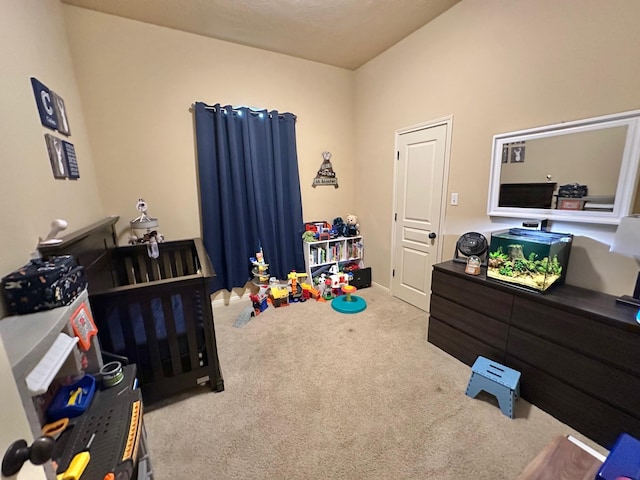 bedroom featuring light carpet