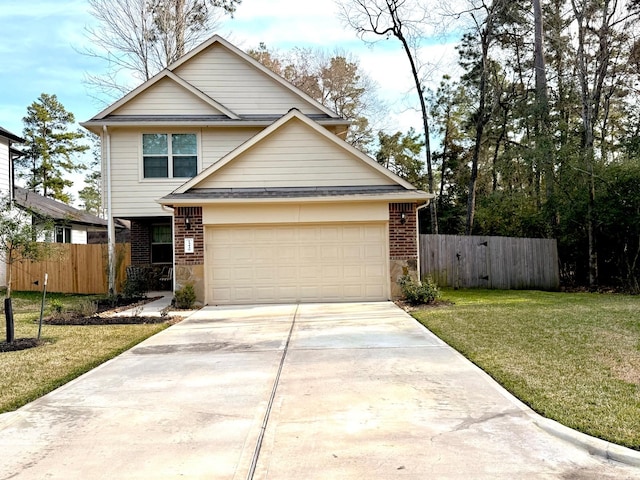 view of front of home featuring a garage and a front yard