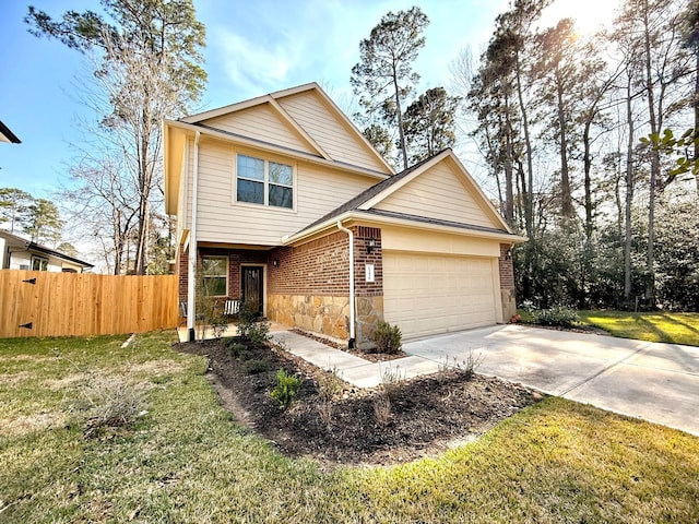 view of front of property with a front lawn and a garage