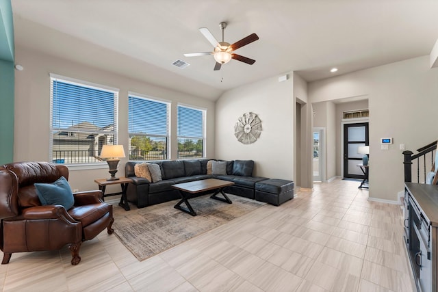 living area with ceiling fan, recessed lighting, visible vents, baseboards, and stairs