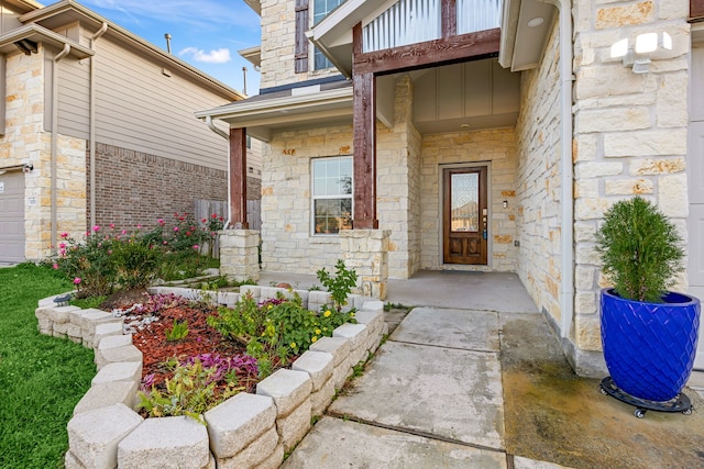 entrance to property featuring stone siding