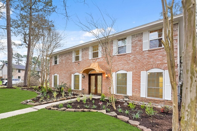 view of front of home featuring a front lawn