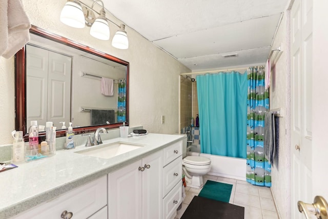 full bathroom featuring tile patterned floors, shower / bath combo, toilet, and vanity