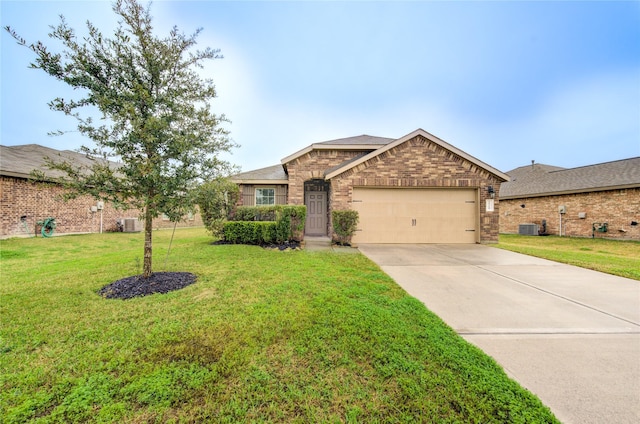 ranch-style house featuring a front yard, cooling unit, and a garage