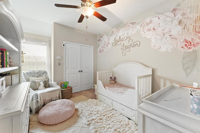 bedroom featuring a closet and a ceiling fan