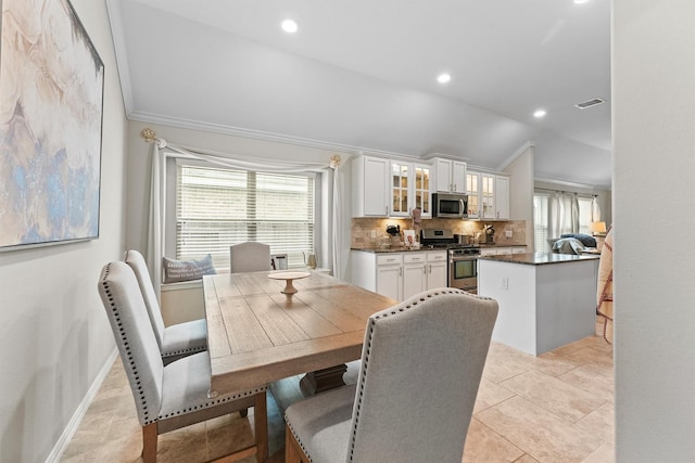 dining area featuring plenty of natural light, visible vents, vaulted ceiling, and recessed lighting