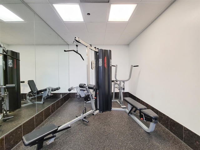 exercise area featuring a drop ceiling