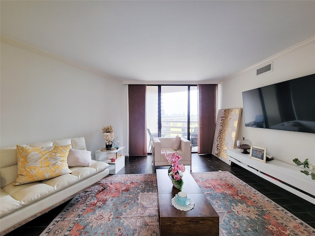 living area featuring visible vents, ornamental molding, a wall of windows, and dark wood-style flooring