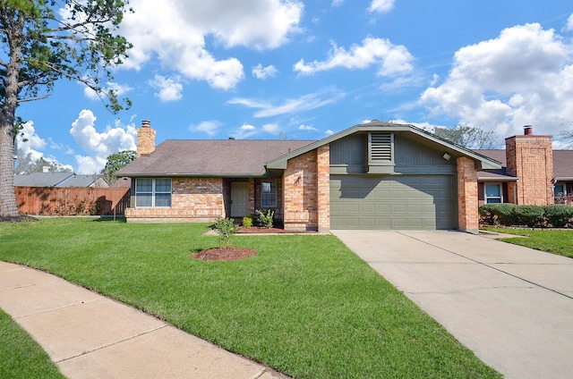 view of front of house with brick siding, a chimney, concrete driveway, a front yard, and a garage