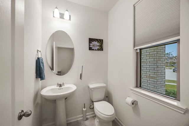 bathroom with sink and toilet