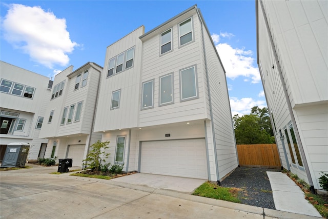 multi unit property featuring a garage