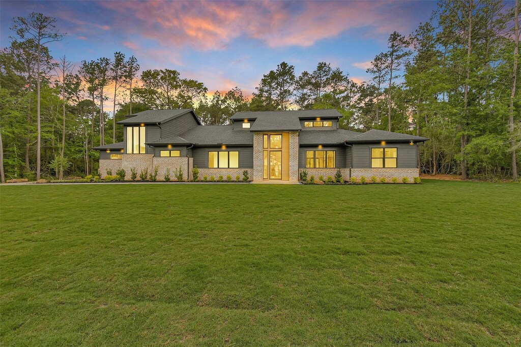 19918 Live Oak Bnd, Magnolia, TX 77355 - view of front of property with a front yard