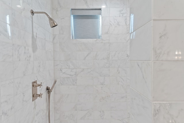 room details with a tile shower