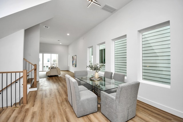 dining space with light wood-type flooring