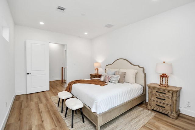 bedroom featuring light hardwood / wood-style flooring