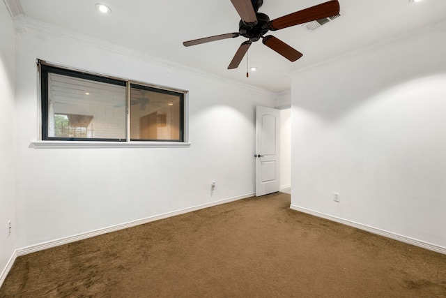 unfurnished room with carpet floors, ornamental molding, and ceiling fan