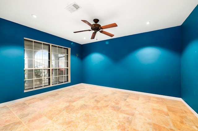 spare room featuring ceiling fan